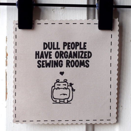 Dull people have organized sewing rooms